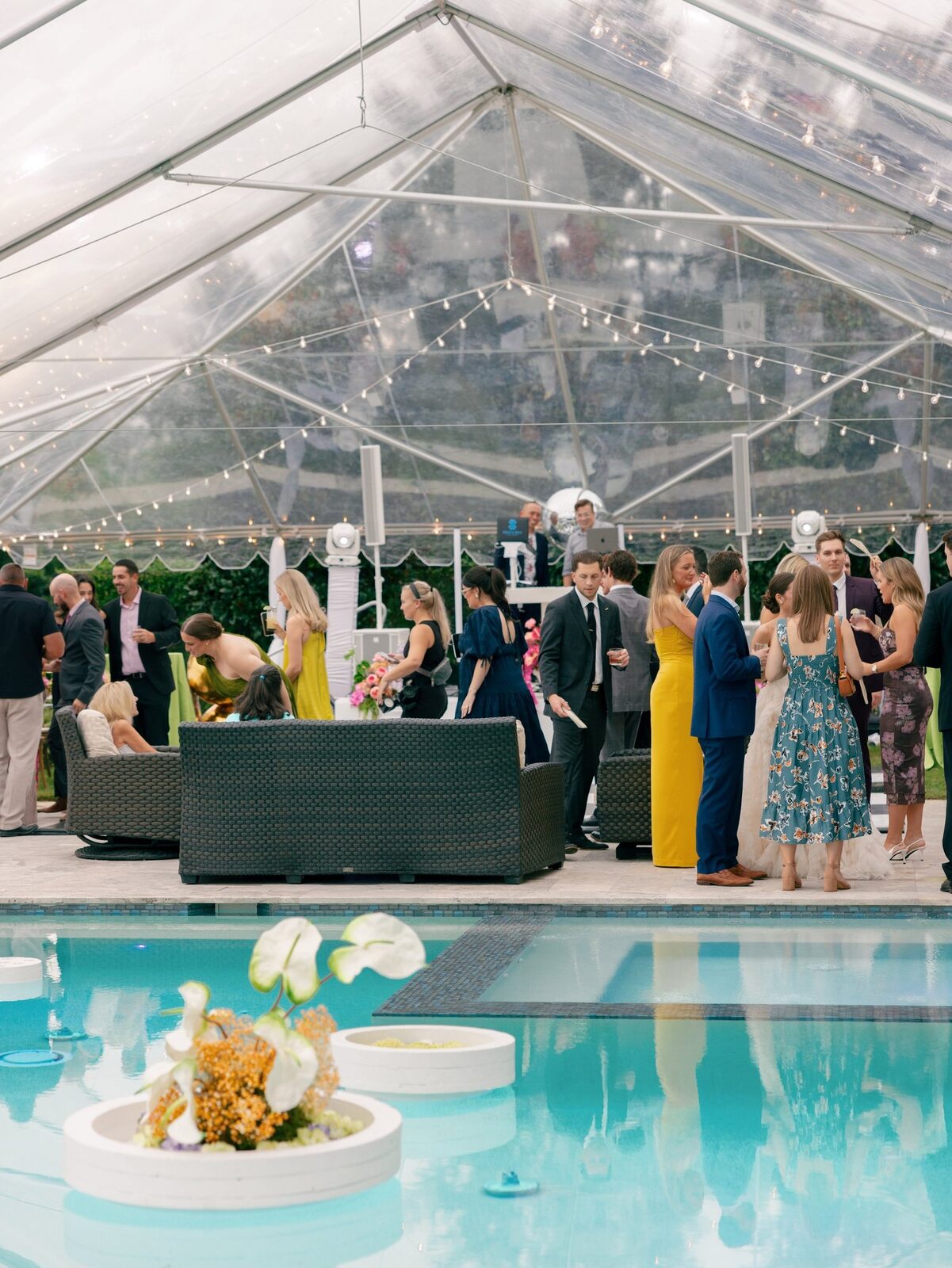 Clear-tent wedding reception overlooking the water