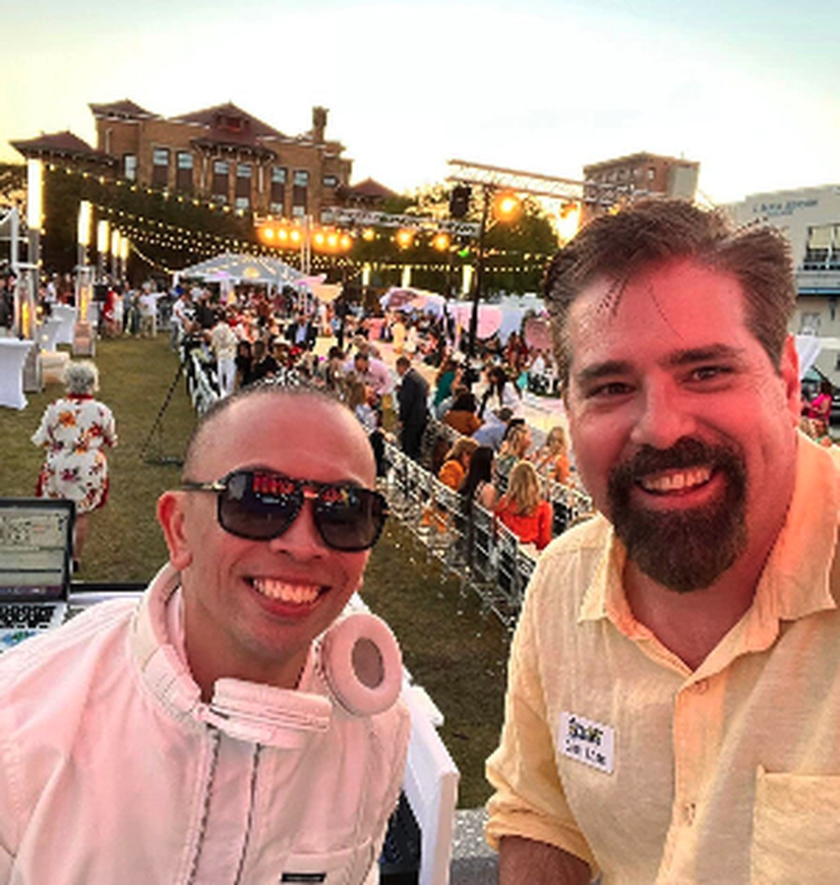 Albert Lao with Brent Lane at an outdoor evening event