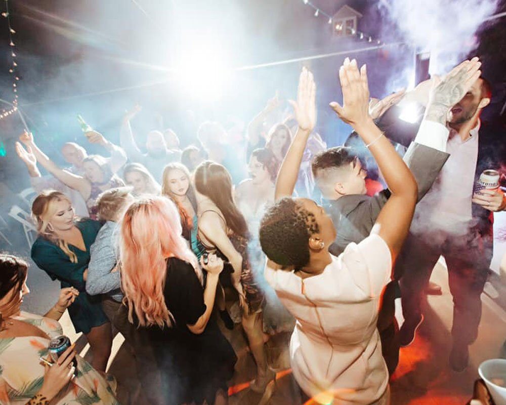 A packed dance floor at a Gulf Coast reception