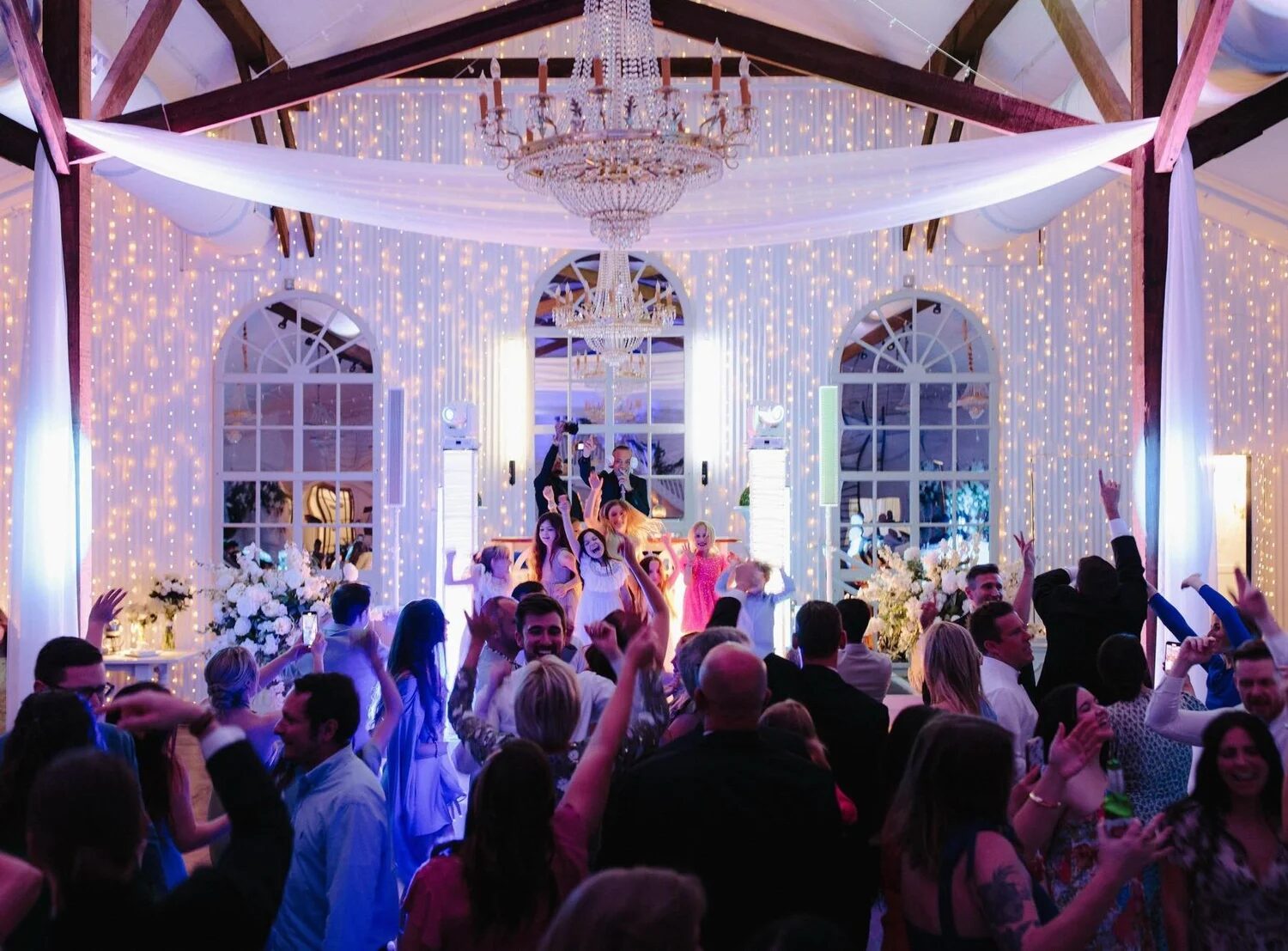 A candlelit reception room before guests arrive